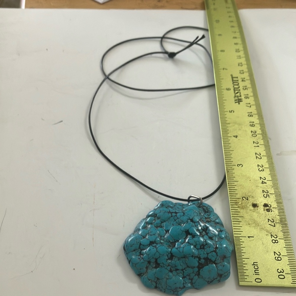 Multi dimensional stone necklace